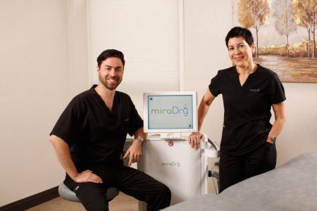 Dr. Weitz next to miraDry machine