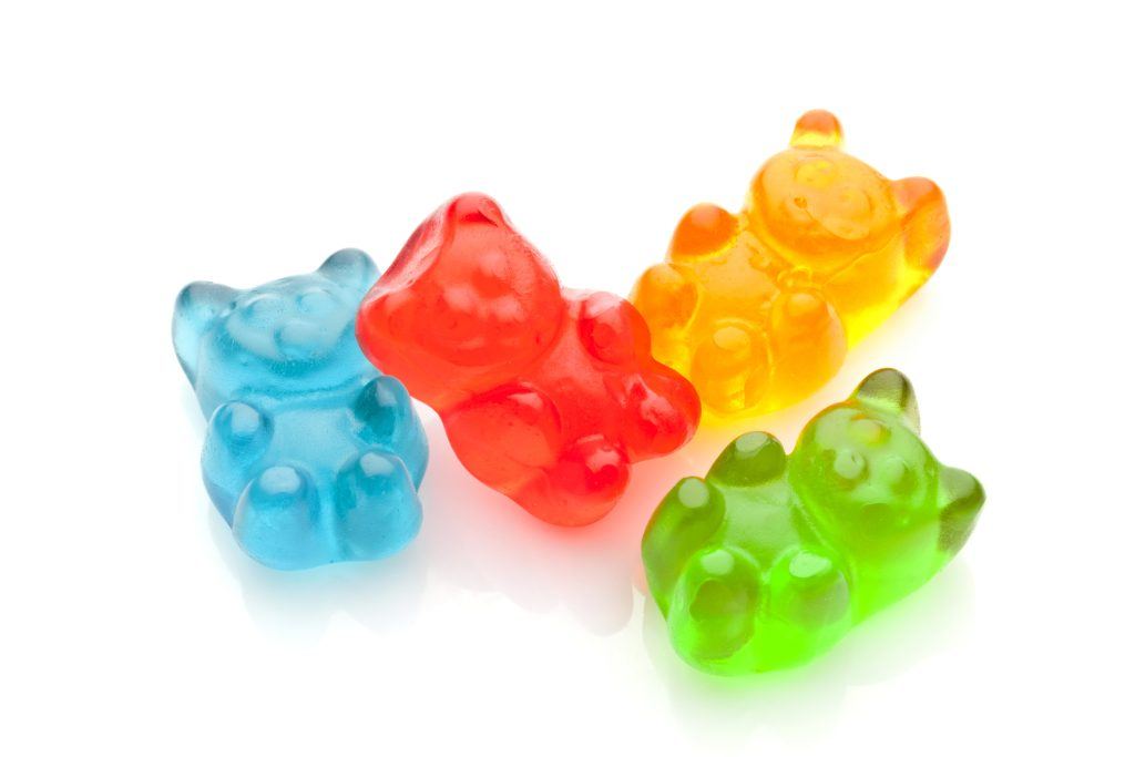 blue, red, yellow, and green gummy bear candies