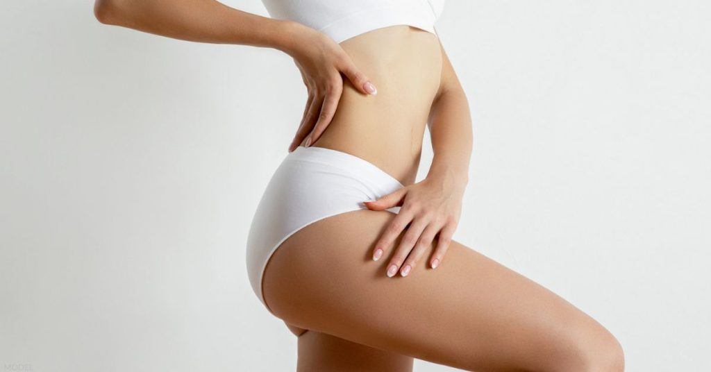 Woman with a fit body (model)
